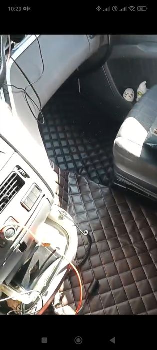 Tapetes DAF e mesa de centro