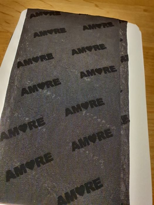 Rajstopy Calzedonia s/m czarne flokowane z napisem AMORE