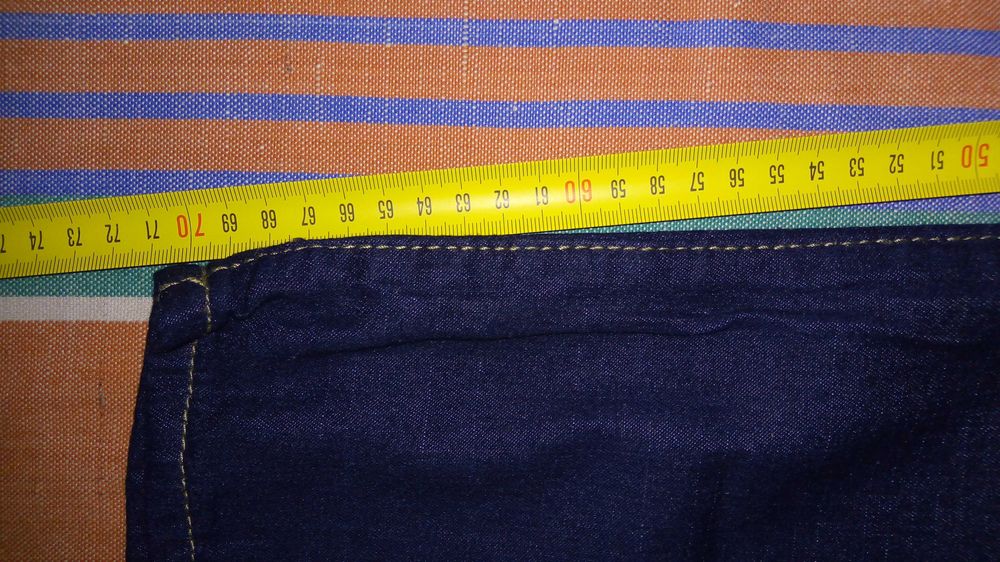 Продам новые джинсовые летние брюки.