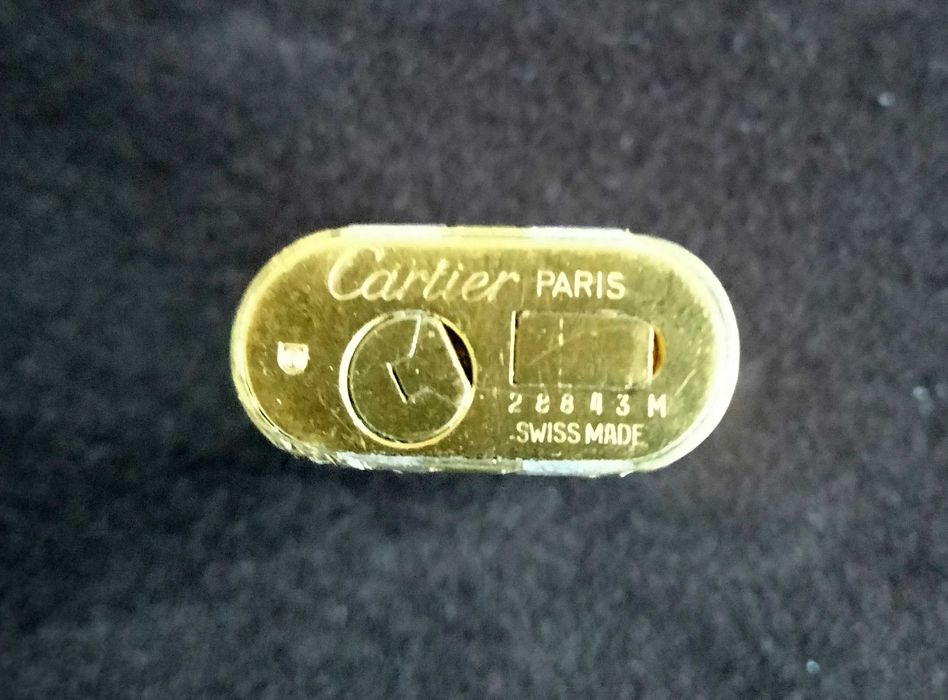 Isqueiros dos anos 70 Cartier Le Must e Cartier Santos