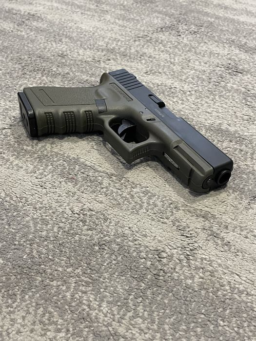 PISTOLA GLOCK 23 OD GREEN GAS BLOWBACK AIRSOFT (ENVIO GRATIS)