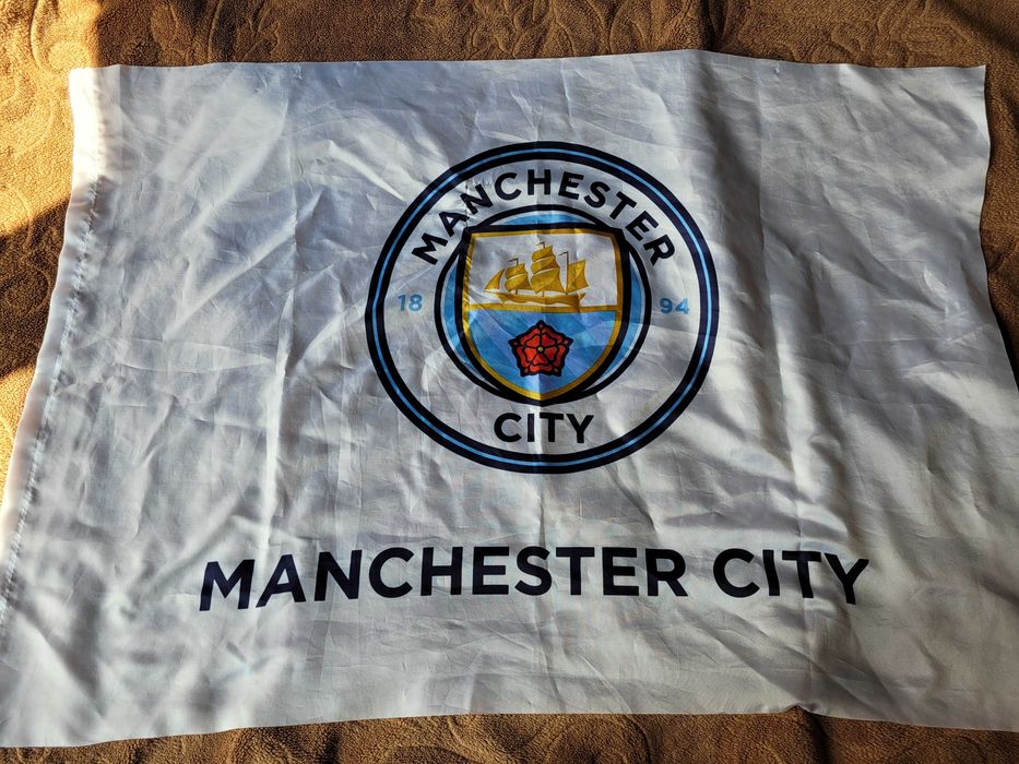Flaga Manchester City przywieziona z 1 meczu półfinału CL z Realem
