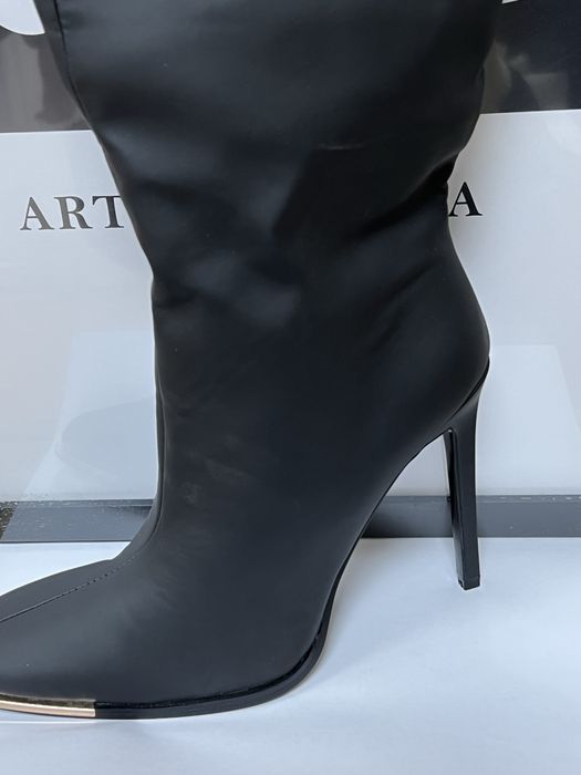 Сапоги на великому каблуці