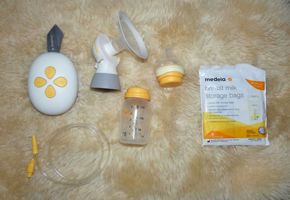 Двухфазный электрический молокоотсос Medela Solo + смартсоска и пакеты