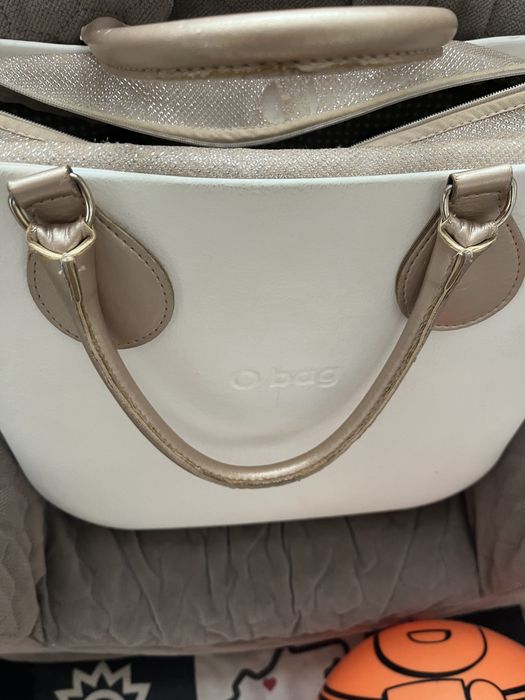 OBAG szampańskie złote uchwyty micro tubolare i organizer Nomi mini