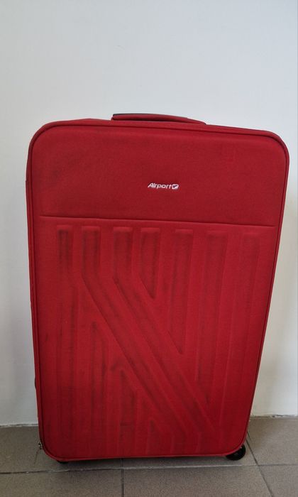 Walizka podróżna czerwona na 4 kółkach materiałowa