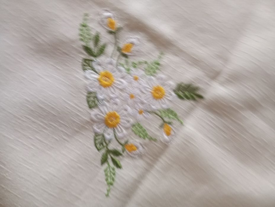 Venda de panos bordados