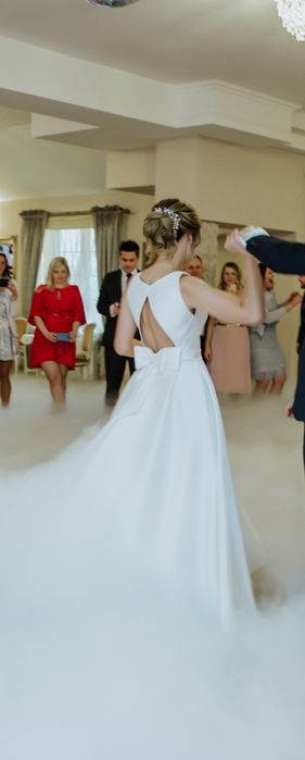 Suknia ślubna MS Moda z kokardą model Ada mikado satynowa gładka