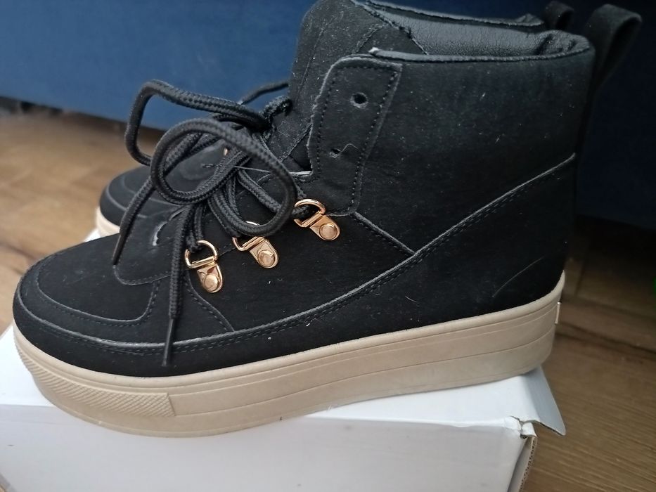 Buty na wyższej podeszwie seastar