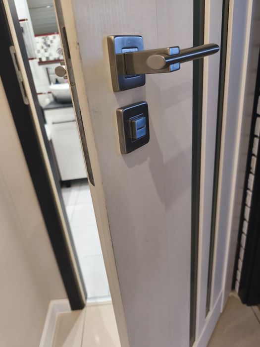 Drzwi wewnętrzne Voster+ klamki Inox