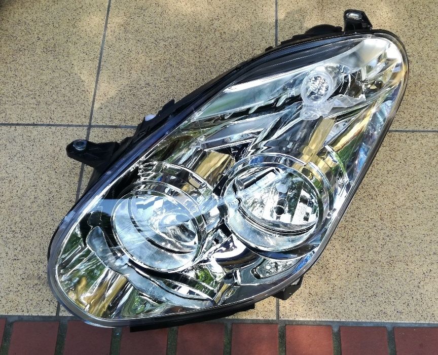 DOBLO COMBO - lampa przednia lewa nowa