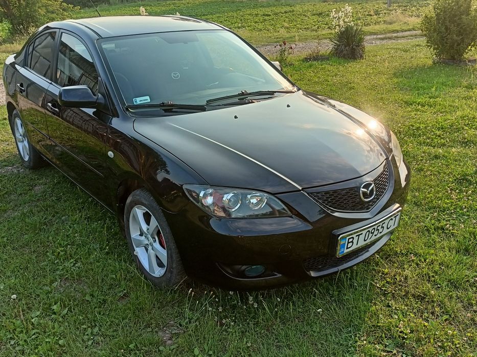 Мазда 3.2006 року