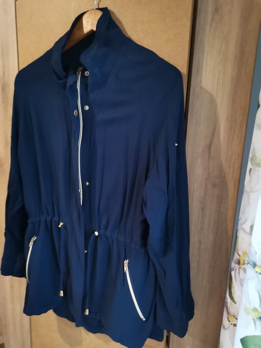 Śliczna pomaranczowa parka 42