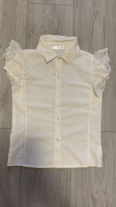 Блузка без рукавів шкільна на дівчинку р128