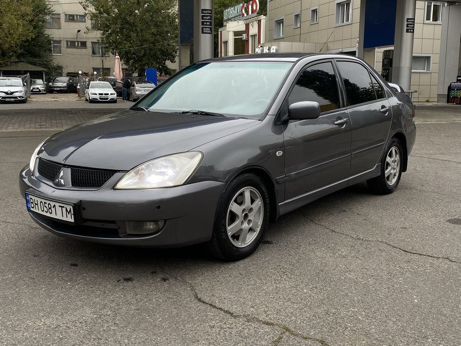 Продам хозяйский Lancer 9
