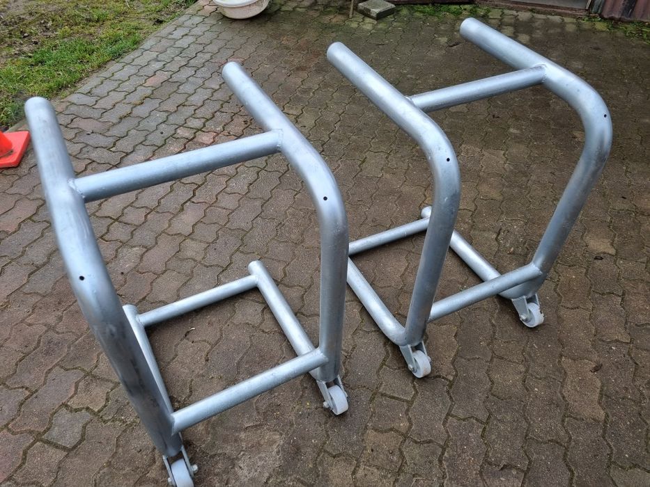 UNICAR TRZY docery  rama plyta blacharska podnosnik nozycowy stan bdb