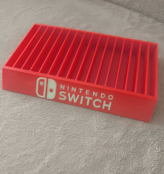 Stojak podstawka na 16 gier Nintendo Switch napis fluorescencyjny