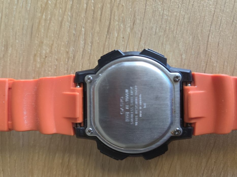 Relógio Casio AE-1000W World Time (Bracelete Laranja)