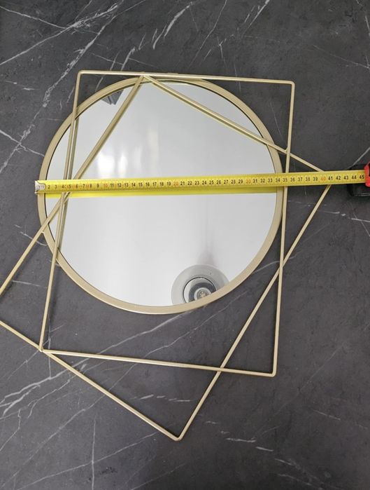 Designerskie lustro naścienne