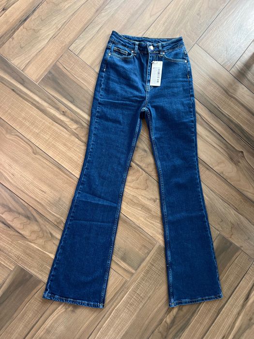 Джинсы клёш темно синего цвета