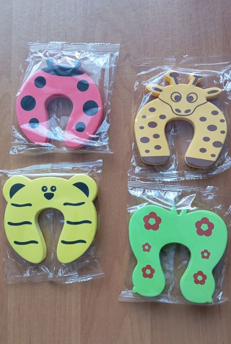 Дитячі стопори для дверей