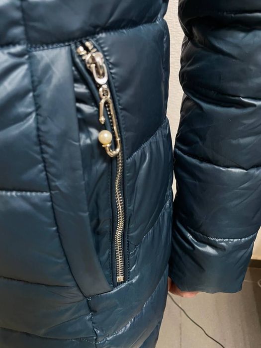 Зимовий пуховик жіночий