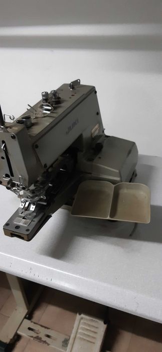 Máquina pregar botões