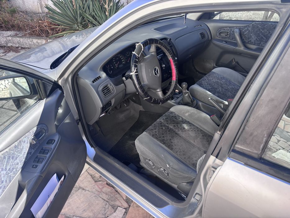 Mazda 323 ano 99
