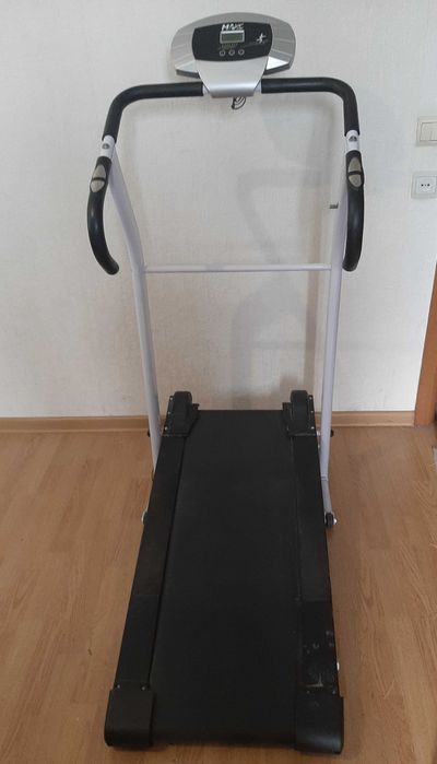 Бігова доріжка механічна