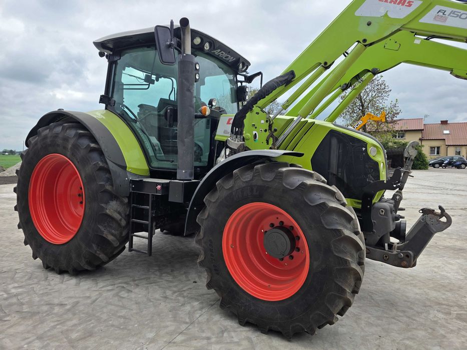 Claas Arion 620 z ładowaczem czołowym Ares Axion