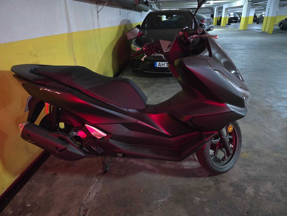 Mota nova com pouco uso