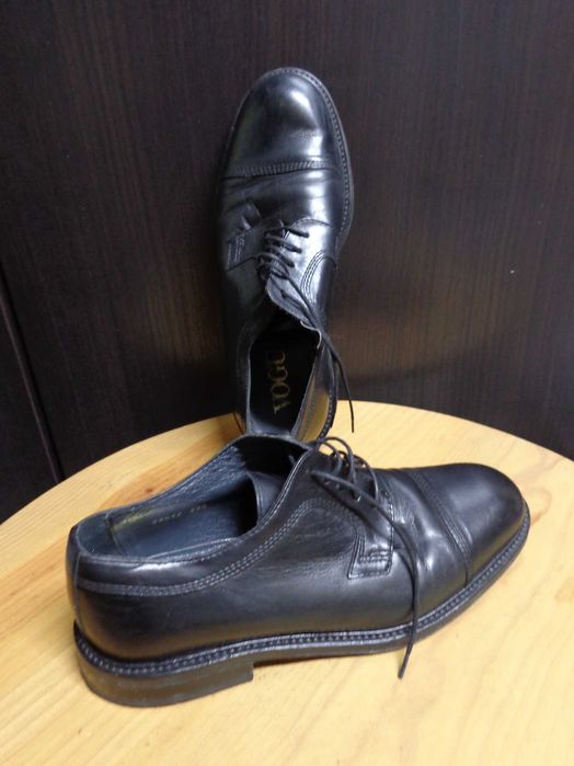 Sapatos de pele pretos