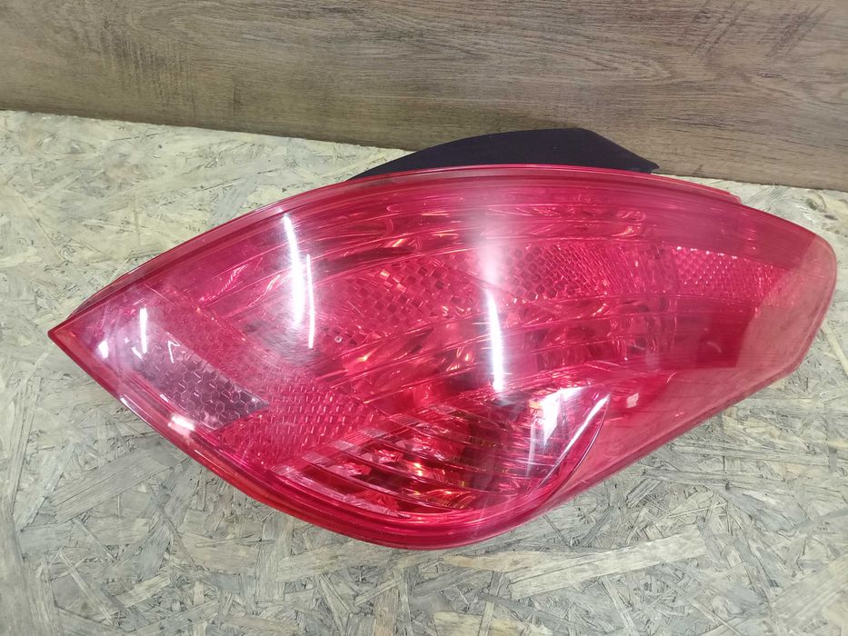 Peugeot 308 T7 hatchback lampa tył tylna prawa lewa oryginał wkład