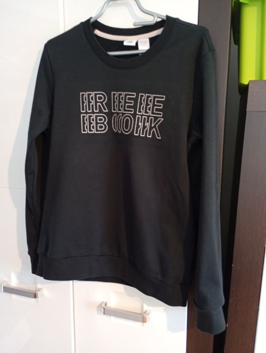Czarny sweter męski.Reebok