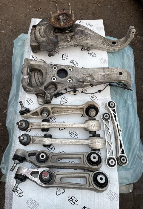 Ричаги,цапфи,колодки датчики ABS перед/зад Tesla model S