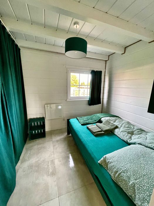 Zielony domek 12 osób Pilchy Roś basen sauna Mazury wynajem