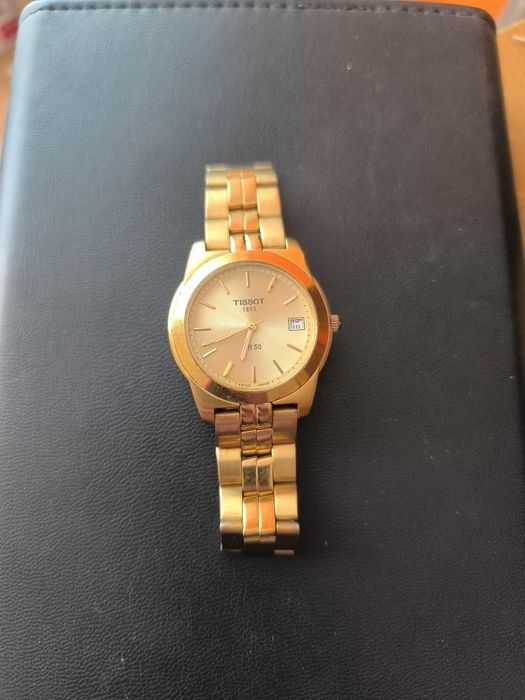 Męski zegarek pozłacany Tissot