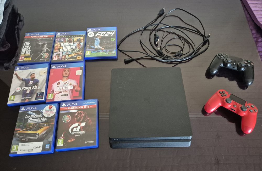 PlayStation 4 + 2 comandos + 6jogos