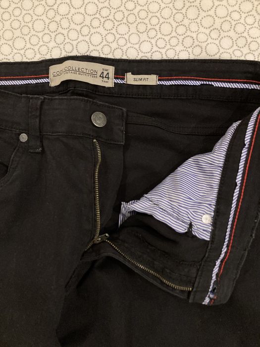 Calças pretas.               ..