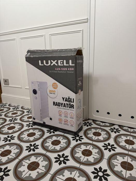 Масляний радіатор Luxell LUX-1225 на 9 секцій. Електричний обігрівач.