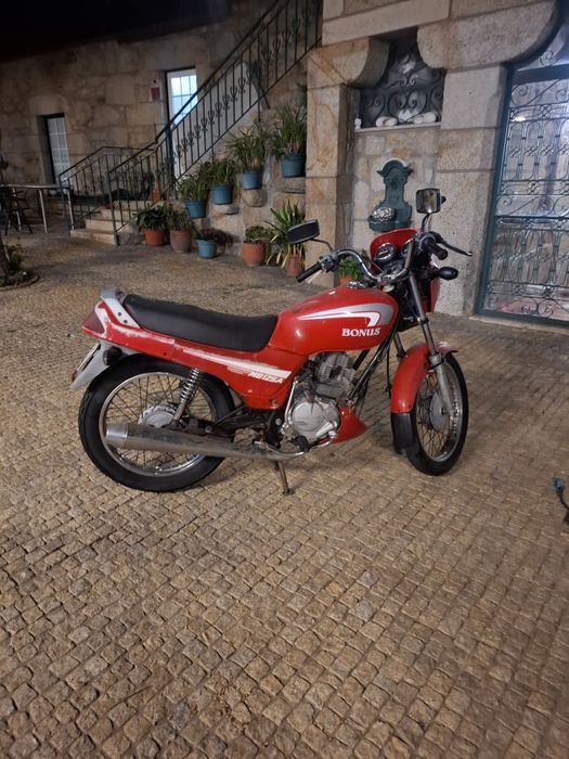 Mota 125 Sanyang   a trabalhar com documentos barata