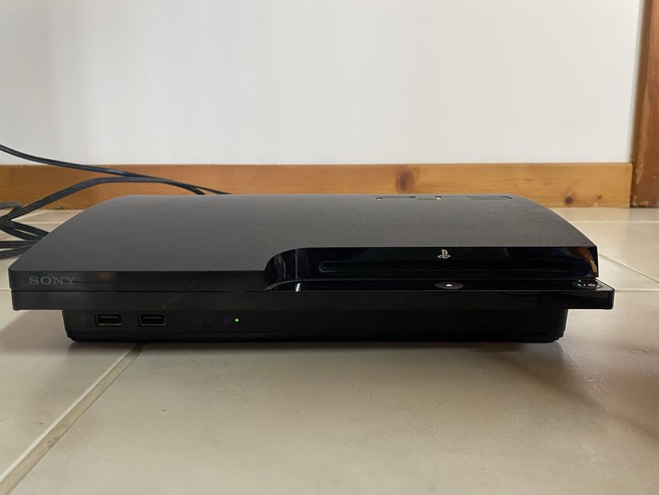 Ps3 Slim + 2 comandos + jogos