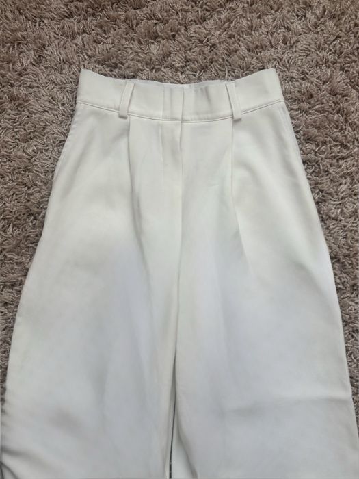 Білі брюки палаццо