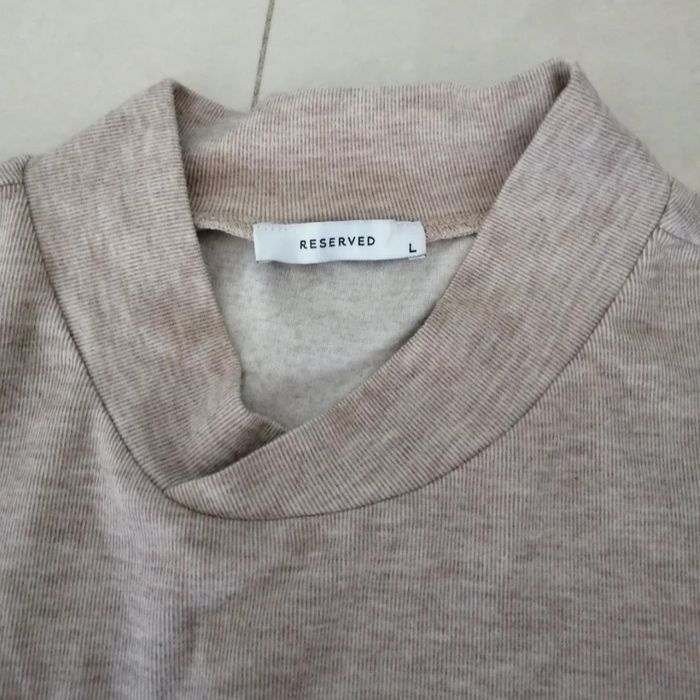 Krótki sweter/bluza w rozmiarze L.