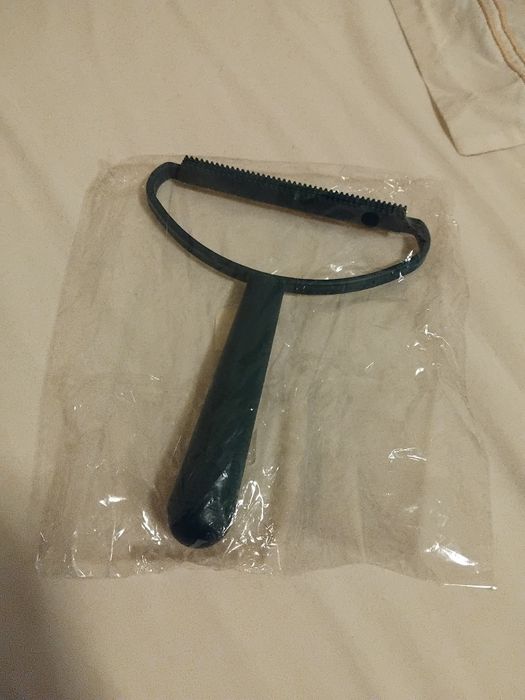 Escovador / cortador / pente para animal ( como cão)