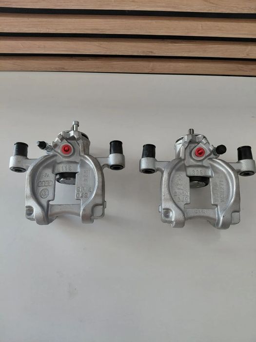 Zacisk hamulca ręcznego Golf VII 7 oryginalny ATE tył prawy lewy