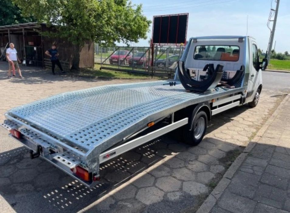 Laweta Holowanie Warszawa pomoc drogowa auto pomoc transport tanio