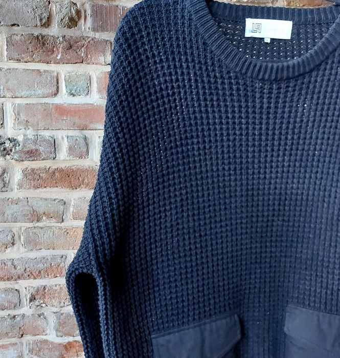 Duży sweter z kieszeniami