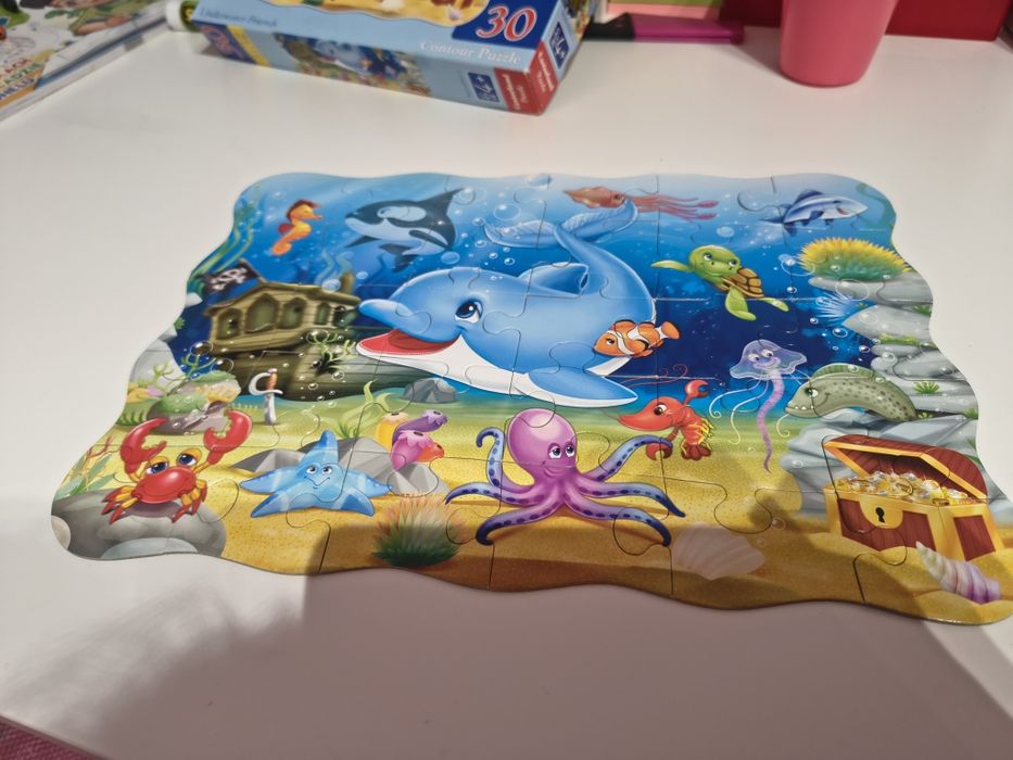 Puzzle delfinek  i ocean