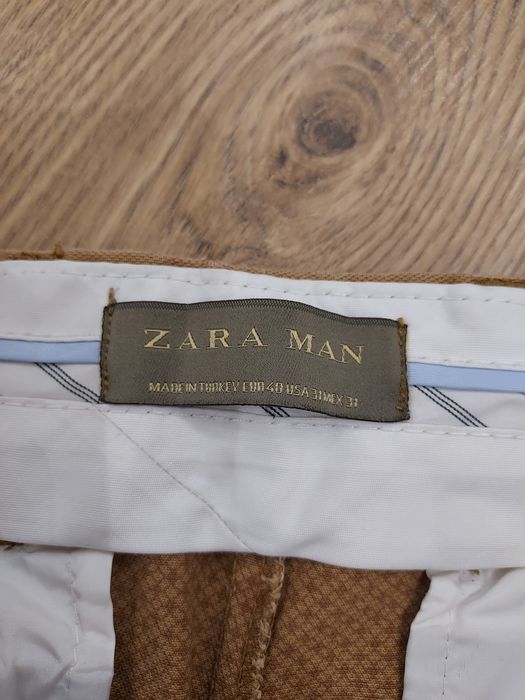 Eleganckie  brązowe spodnie męskie zara